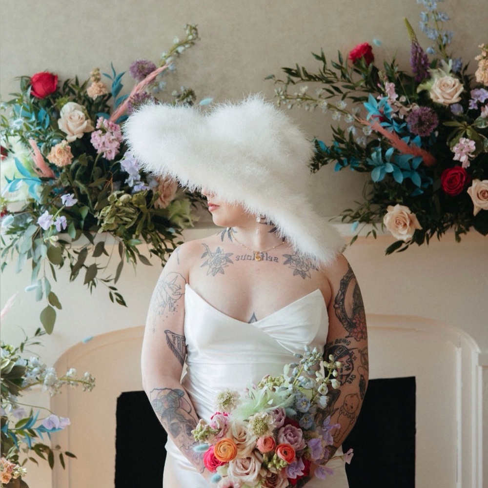 White fuzzy wide brim hat